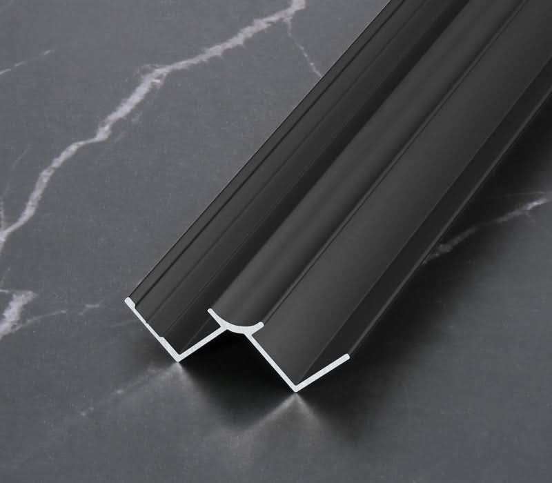 Black aluminum wall panel trim H-joint profile, durable metal connector for joining decorative wall panels with a clean modern finish