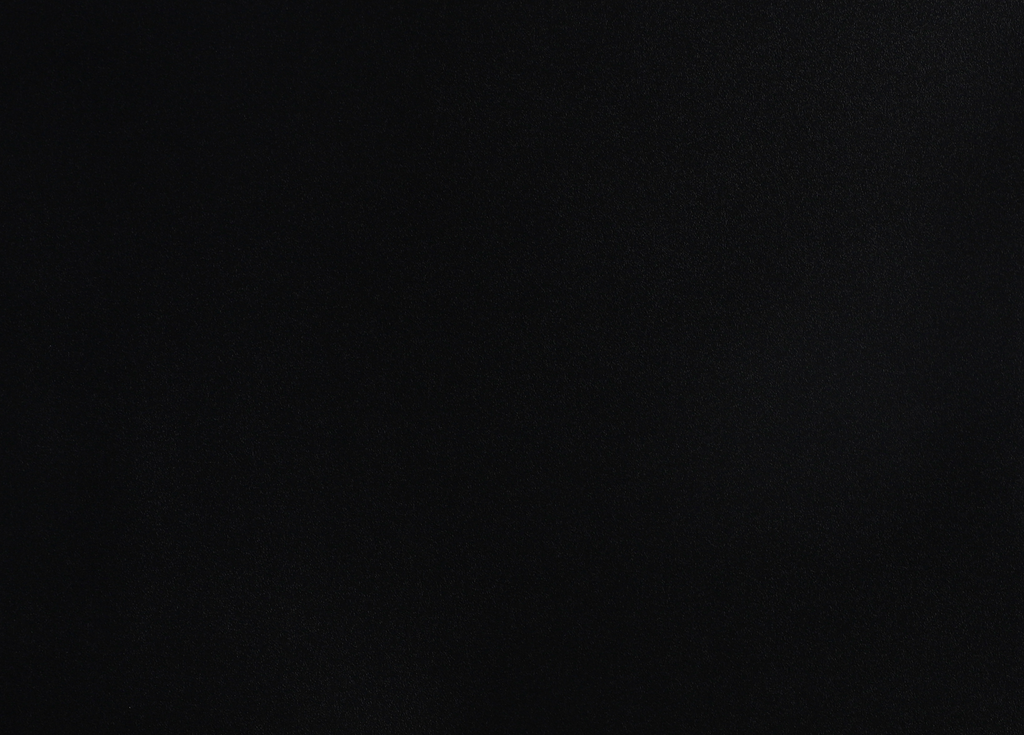 Luxe Noir matte black WPC fluted wall panel surface texture close-up