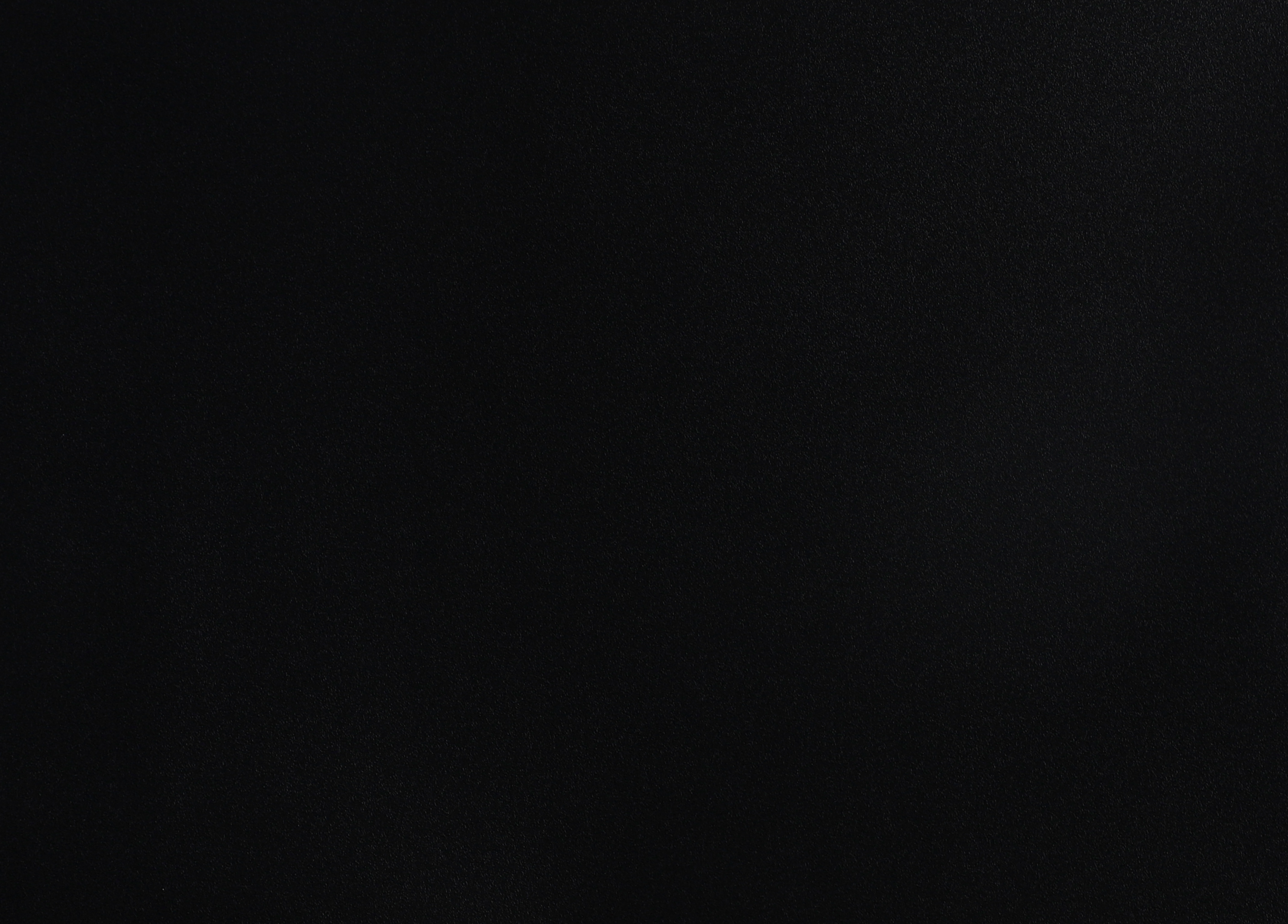 Luxe Noir matte black WPC fluted wall panel surface texture close-up