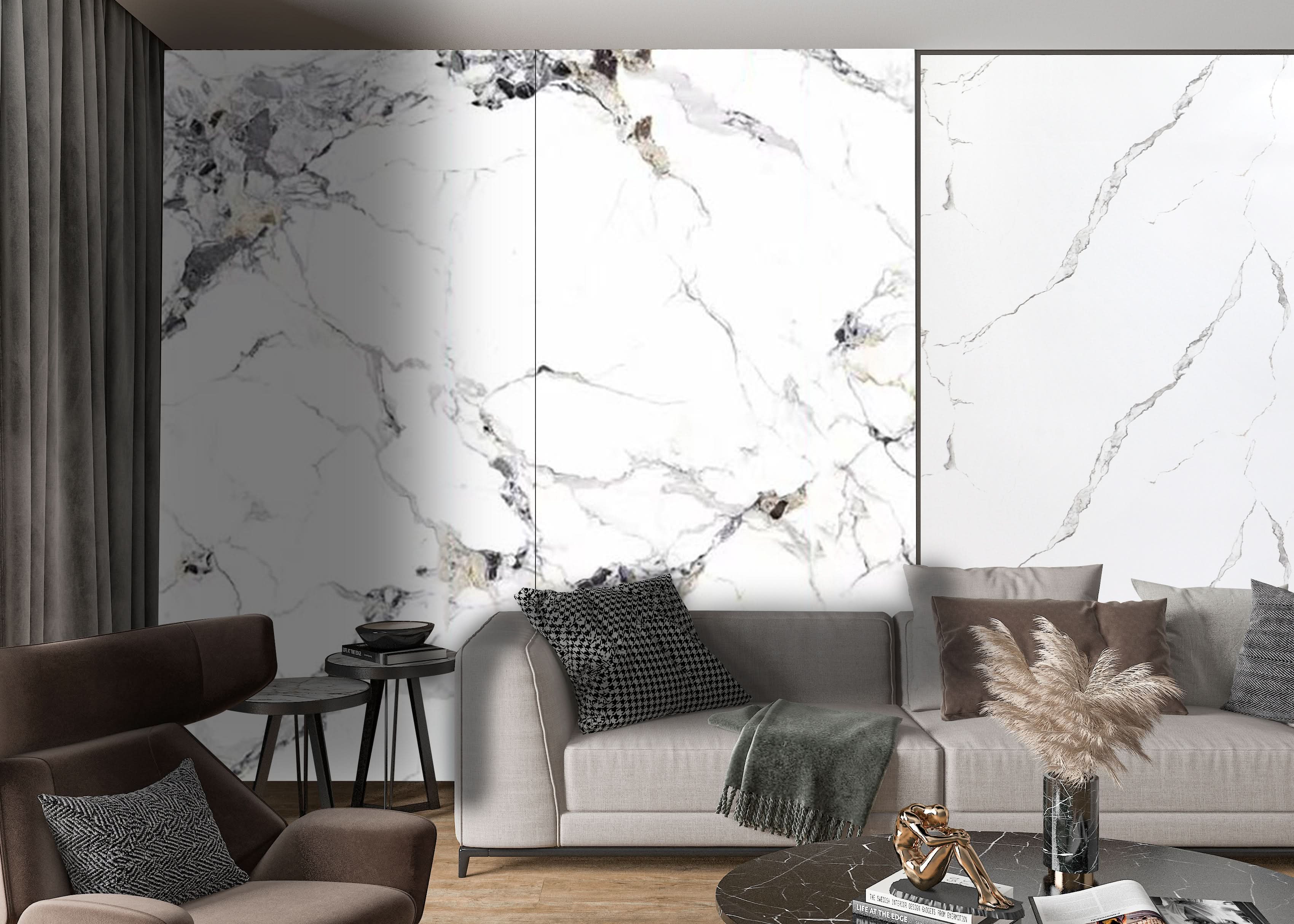 Modern living room with white marble wall panels, gray sofa, and warm neutral decor