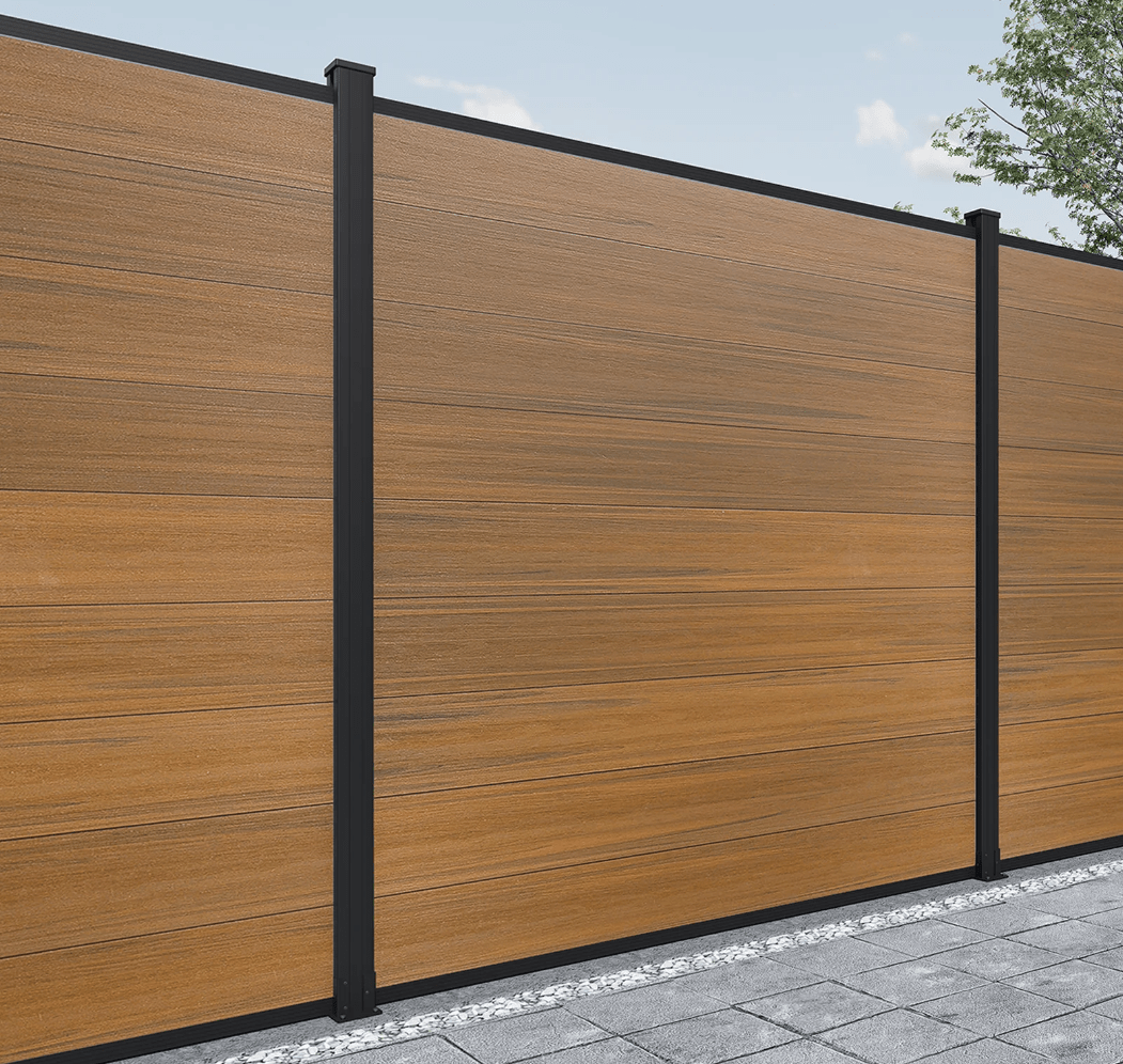 Brown composite fence with wood grain texture, horizontal planks, installed on stone foundation in NJ. Main image