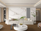 Modern living room with beige marble wall panels and neutral decor
