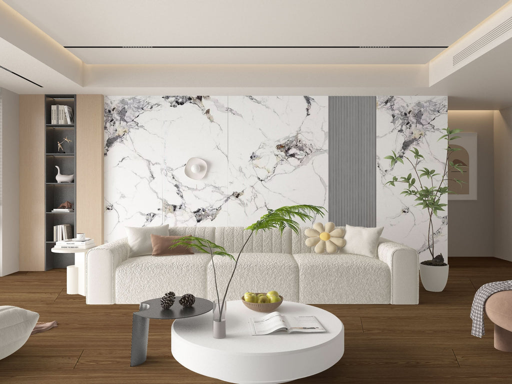 Modern living room with white marble wall panels, neutral furniture, and wood flooring