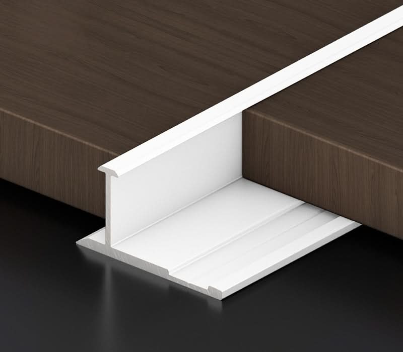 White aluminum wall panel T trim installed between panels for clean joint finishing