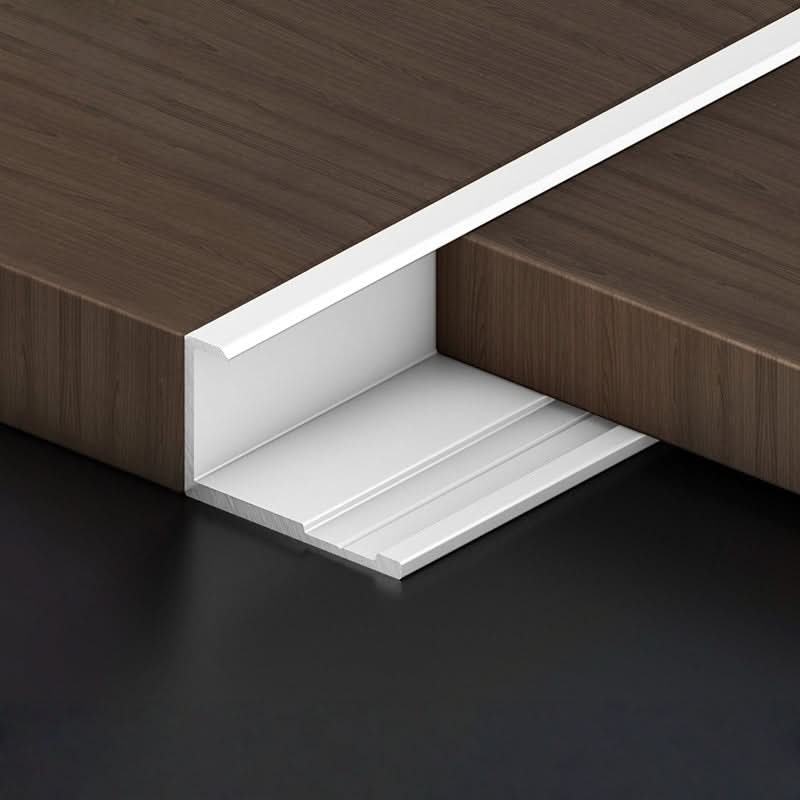White aluminum wall panel trim end cap installed between wood panels, durable metal edge strip for clean panel edges and modern interior wall finishes
