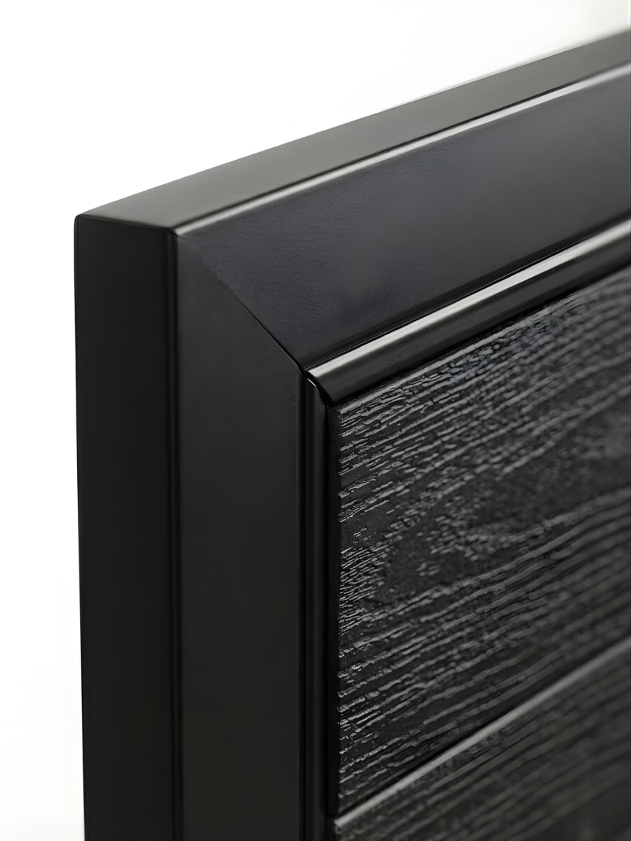 Black WPC composite fence gate installed in backyard privacy fence