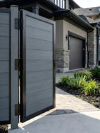 Contemporary light gray fence gate made from WPC composite material
