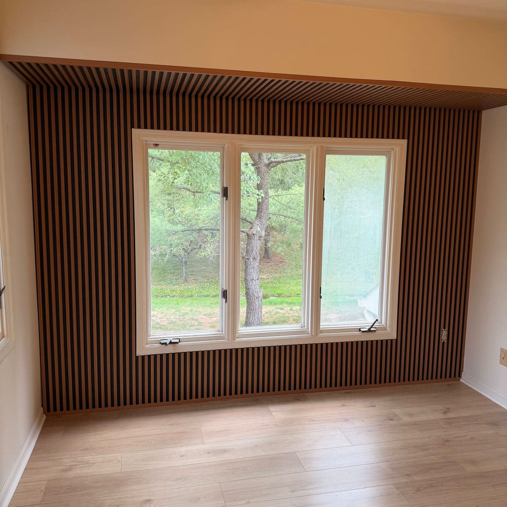 Maple Slate Black WPC fluted wall panels installed as a vertical accent wall around window